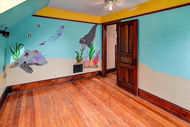 1235 Chandler St, Madison, WI 53715 - spare room featuring ceiling fan, wood finished floors, and baseboards
