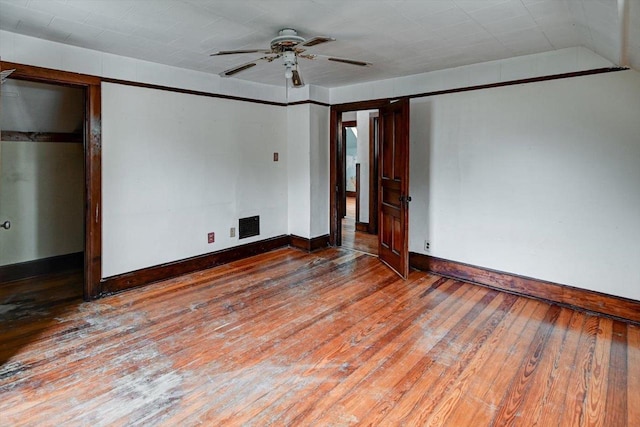 1235 Chandler St, Madison, WI 53715 - unfurnished bedroom featuring hardwood / wood-style floors, baseboards, and ceiling fan