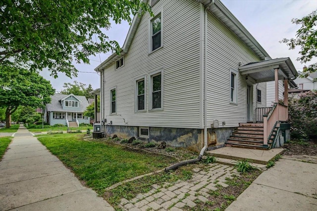 1235 Chandler St, Madison, WI 53715 - view of side of property featuring a lawn