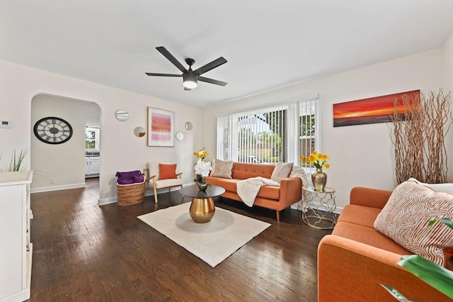 5002 N 24th Pl, Milwaukee, WI 53209 - living room featuring arched walkways, ceiling fan, wood finished floors, and baseboards