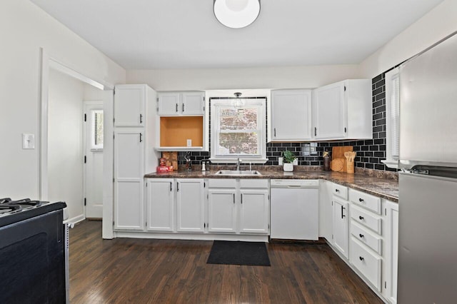 5002 N 24th Pl, Milwaukee, WI 53209 - kitchen featuring dishwasher, stainless steel fridge, a sink, stove, and white cabinets