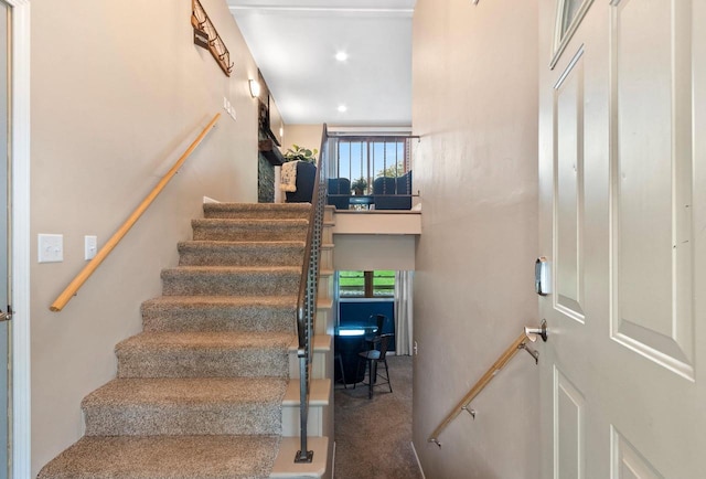 1254 Thorndale St, Green Bay, WI 54304 - stairway featuring carpet floors and recessed lighting