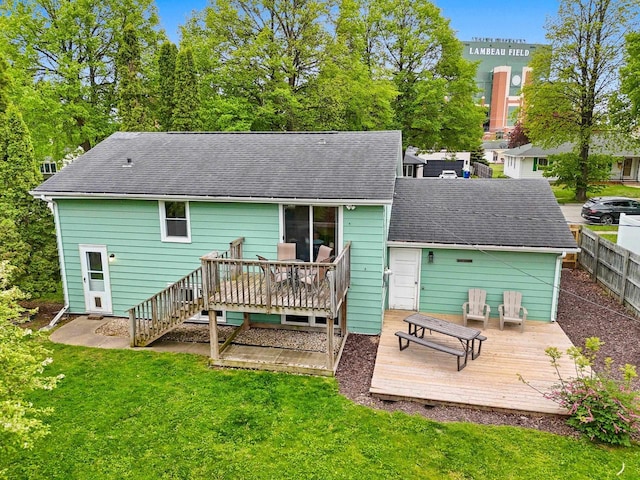 1254 Thorndale St, Green Bay, WI 54304 - rear view of house featuring a deck and roof with shingles