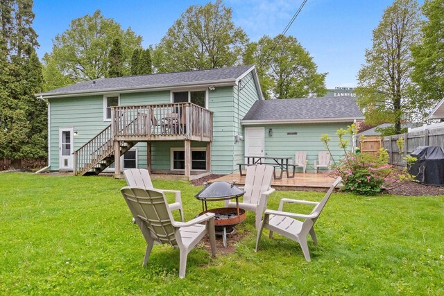1254 Thorndale St, Green Bay, WI 54304 - rear view of house with a fire pit, a deck, and stairs