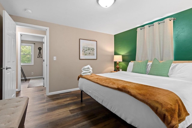 1254 Thorndale St, Green Bay, WI 54304 - bedroom with dark wood finished floors and baseboards
