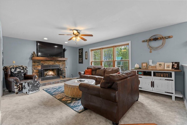 1620 Fieldstone Ln, Howards Grove, WI 53083 - carpeted living room featuring ceiling fan, a stone fireplace, and recessed lighting