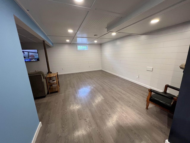 S9085 Meadowdale Rd, Prairie Du Sac, WI 53578 - below grade area with baseboards and wood finished floors
