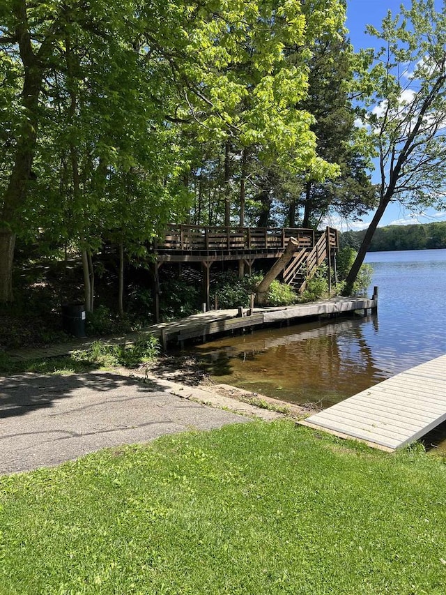 S9085 Meadowdale Rd, Prairie Du Sac, WI 53578 - dock featuring a water view and a yard
