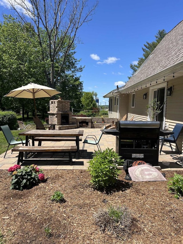 S9085 Meadowdale Rd, Prairie Du Sac, WI 53578 - view of yard with an outdoor fireplace and a patio area