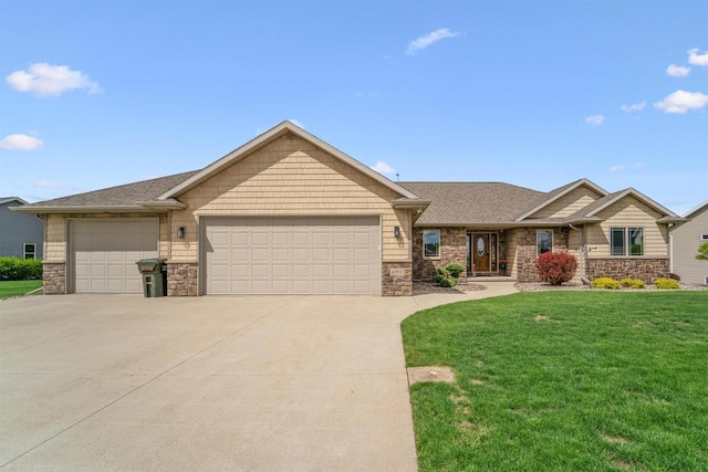 4201 Fieldcrest Dr, Kaukauna, WI 54130 - view of front of property with stone siding, concrete driveway, a garage, a front yard, and roof with shingles