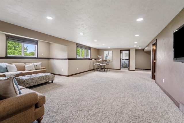 4201 Fieldcrest Dr, Kaukauna, WI 54130 - living room with light colored carpet, recessed lighting, and baseboards