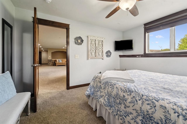 4201 Fieldcrest Dr, Kaukauna, WI 54130 - carpeted bedroom featuring baseboards and a ceiling fan