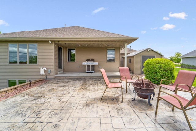 4201 Fieldcrest Dr, Kaukauna, WI 54130 - view of patio / terrace featuring a fire pit and grilling area