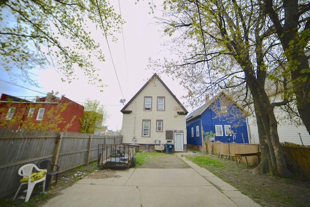 1925 W Center St, Milwaukee, WI 53206 - rear view of property featuring a patio area