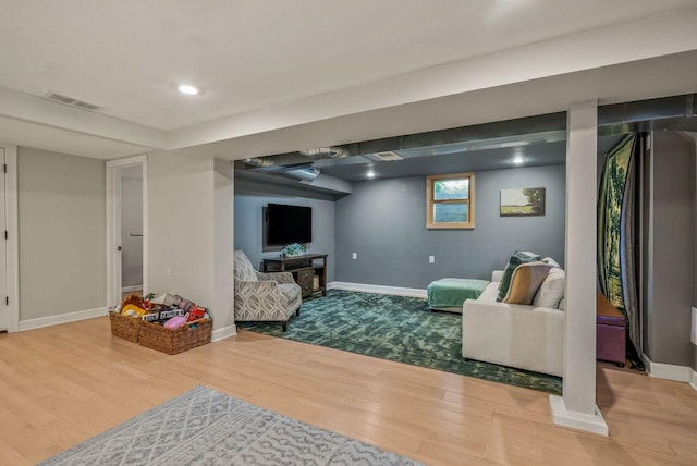 5642 N Argyle Ave, Glendale, WI 53209 - living area featuring wood finished floors, baseboards, and recessed lighting