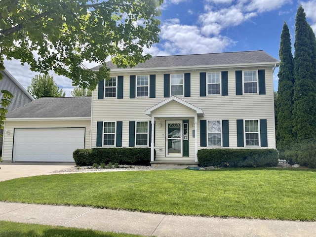 1401 E Bedford Ln, Appleton, WI 54915 - colonial home with an attached garage, driveway, and a front lawn