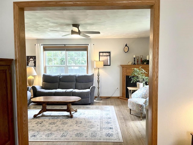 1401 E Bedford Ln, Appleton, WI 54915 - living area with light wood finished floors, a ceiling fan, and baseboards