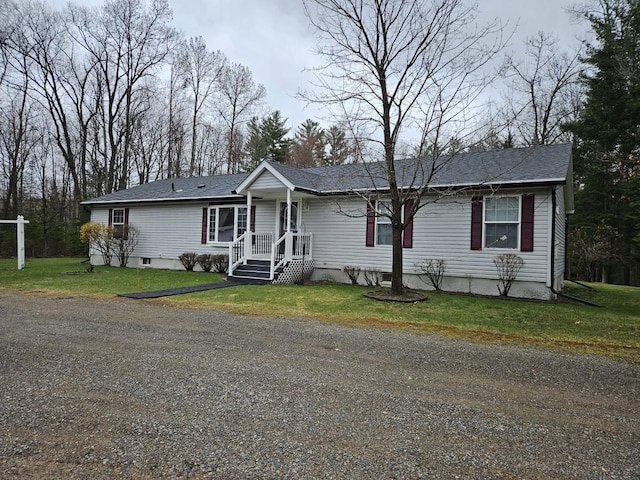 7098 Fire Tower Rd, Rhinelander, WI 54501 - view of front facade featuring a front yard and roof with shingles