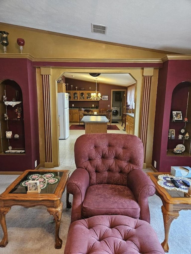 7098 Fire Tower Rd, Rhinelander, WI 54501 - living room featuring arched walkways, crown molding, light carpet, and a chandelier