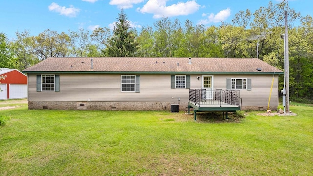 8401 4th Ave, Almond, WI 54909 - rear view of property with crawl space, a yard, an outbuilding, and central air condition unit