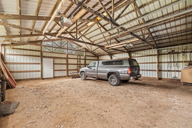 8401 4th Ave, Almond, WI 54909 - garage with a garage door opener and metal wall