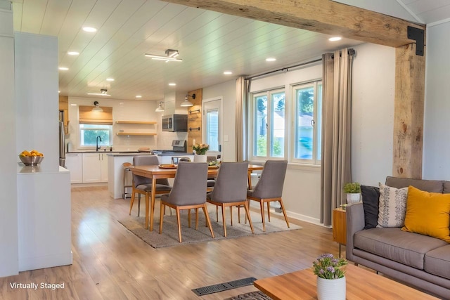 1230 Hiawatha Dr, Beaver Dam, WI 53916 - dining space with recessed lighting, light wood finished floors, and wood ceiling
