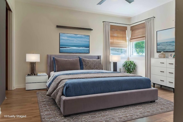 1230 Hiawatha Dr, Beaver Dam, WI 53916 - bedroom featuring wood finished floors and a ceiling fan