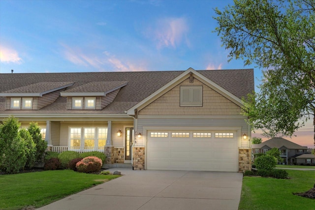 1758 Raintree Ln Unit 45, Mount Pleasant, WI 53406 - craftsman inspired home featuring stone siding, driveway, a front lawn, a garage, and a shingled roof