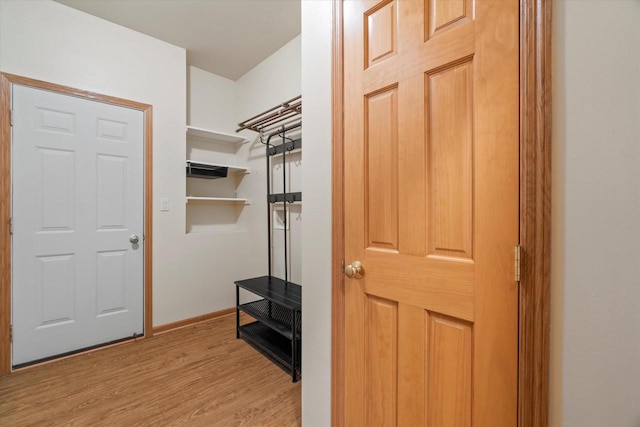 1758 Raintree Ln Unit 45, Mount Pleasant, WI 53406 - walk in closet featuring light wood-type flooring