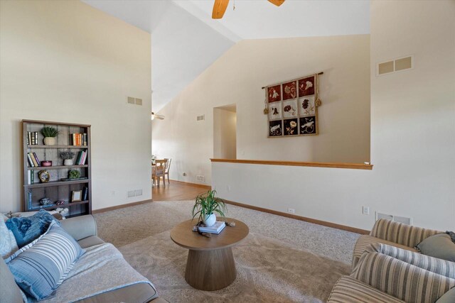 1758 Raintree Ln Unit 45, Mount Pleasant, WI 53406 - carpeted living room with ceiling fan, lofted ceiling, and baseboards