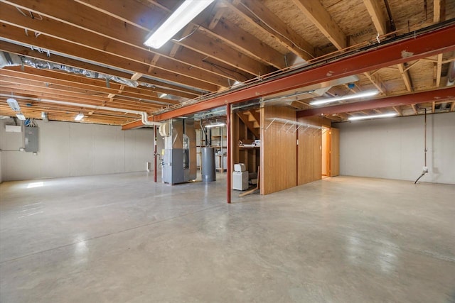 1758 Raintree Ln Unit 45, Mount Pleasant, WI 53406 - unfinished basement featuring gas water heater, heating unit, and electric panel