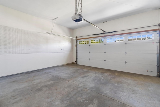1758 Raintree Ln Unit 45, Mount Pleasant, WI 53406 - garage featuring a garage door opener