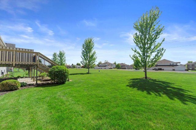 1758 Raintree Ln Unit 45, Mount Pleasant, WI 53406 - view of green lawn featuring stairway and a residential view