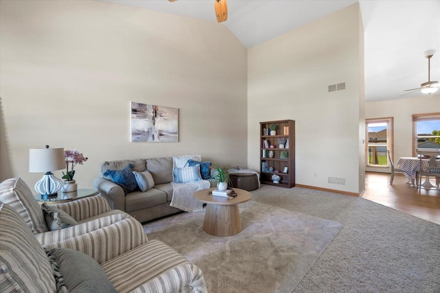 1758 Raintree Ln Unit 45, Mount Pleasant, WI 53406 - carpeted living area with a ceiling fan, baseboards, and high vaulted ceiling