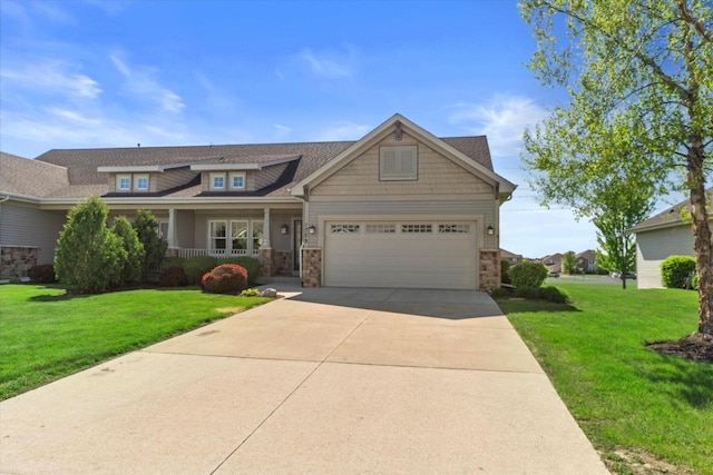 1758 Raintree Ln Unit 45, Mount Pleasant, WI 53406 - craftsman inspired home featuring covered porch, a front lawn, driveway, and stone siding