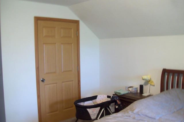 N5795 County Road A, Deerbrook, WI 54424 - bedroom featuring vaulted ceiling