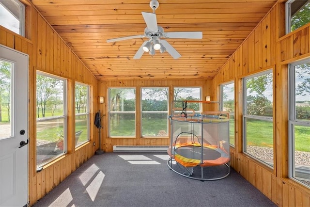 E7065 E County Road B, Colfax, WI 54730 - sunroom / solarium featuring a baseboard heating unit, vaulted ceiling, and a ceiling fan