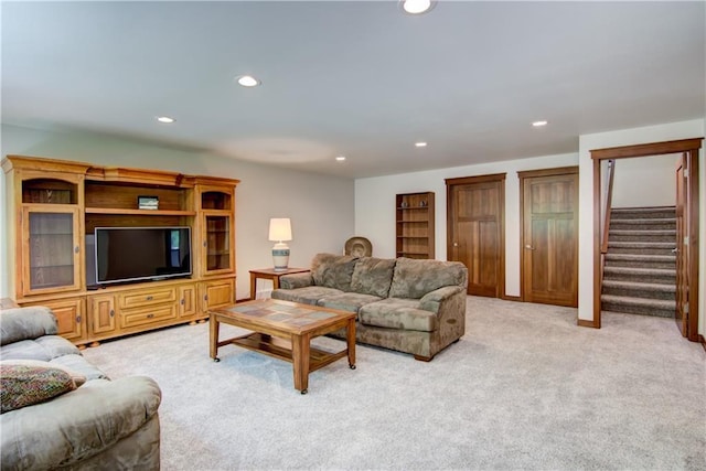 4708 Abbey Rd, Eau Claire, WI 54701 - living area featuring light carpet, stairs, and recessed lighting