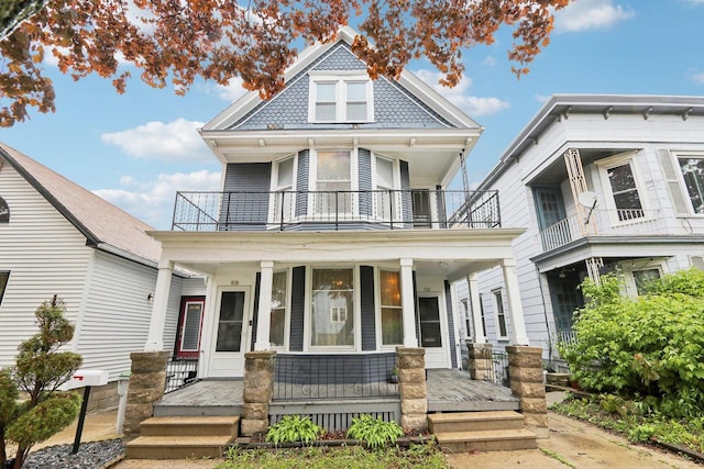 310 E Smith St Unit 312, Milwaukee, WI 53207 - victorian house with a balcony and a porch