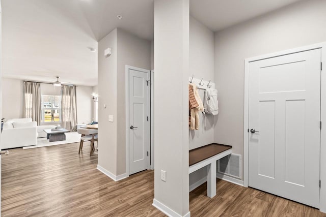 4857 Suelo Rd, Fitchburg, WI 53711 - mudroom featuring wood finished floors and baseboards