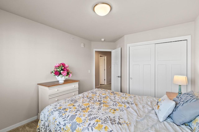 4857 Suelo Rd, Fitchburg, WI 53711 - carpeted bedroom featuring baseboards and a closet