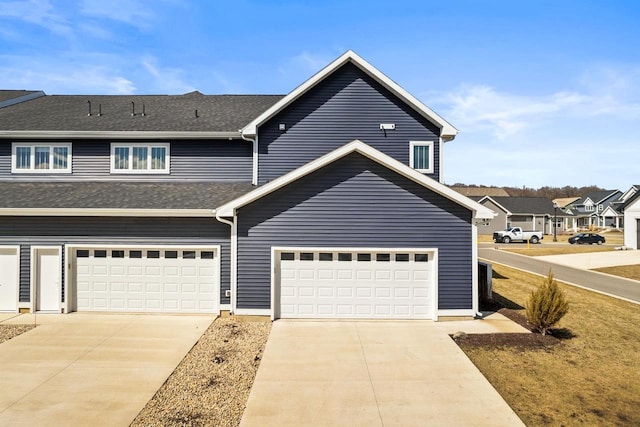 4857 Suelo Rd, Fitchburg, WI 53711 - view of front of home with concrete driveway and a shingled roof
