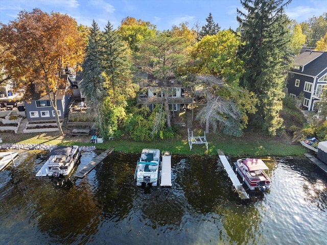 N53W34956 Rd B, Okauchee, WI 53069 - dock area featuring a water view and view of scattered trees