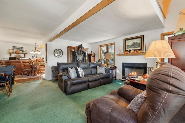 N53W34956 Rd B, Okauchee, WI 53069 - living area with a warm lit fireplace, carpet, a chandelier, and beamed ceiling