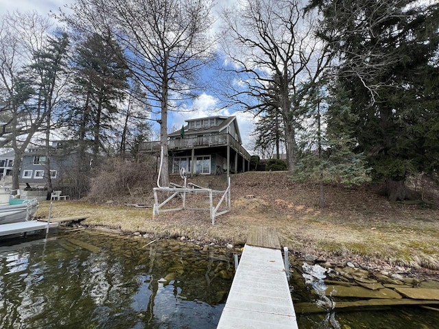 N53W34956 Rd B, Okauchee, WI 53069 - dock area featuring a deck with water view