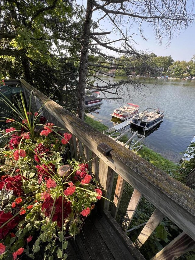 N53W34956 Rd B, Okauchee, WI 53069 - dock area featuring a water view