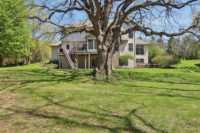 10 Prairie Hill Ct, Madison, WI 53719 - view of grassy yard with stairway and a wooden deck