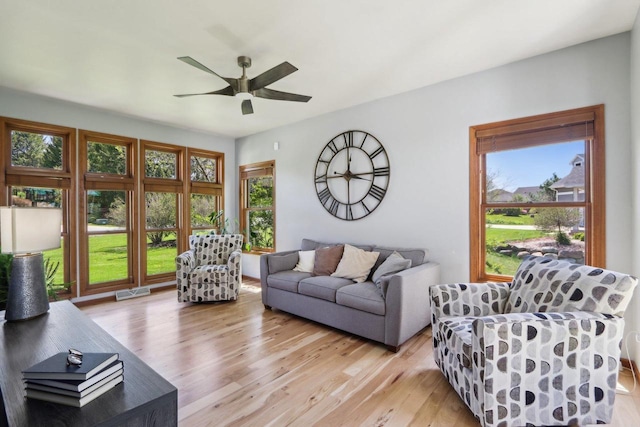 10 Prairie Hill Ct, Madison, WI 53719 - living area featuring light wood-type flooring and a ceiling fan