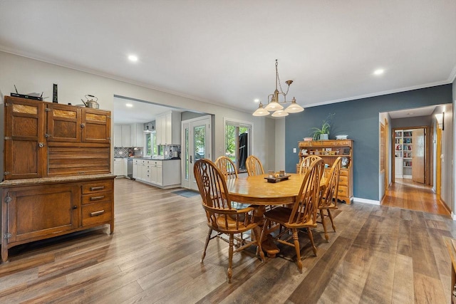 N3504 State Rd 80, Elroy, WI 53929 - dining area with ornamental molding, wood finished floors, recessed lighting, and a chandelier