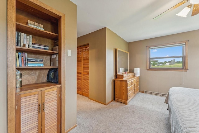 N3504 State Rd 80, Elroy, WI 53929 - carpeted bedroom with baseboards, a closet, and a ceiling fan